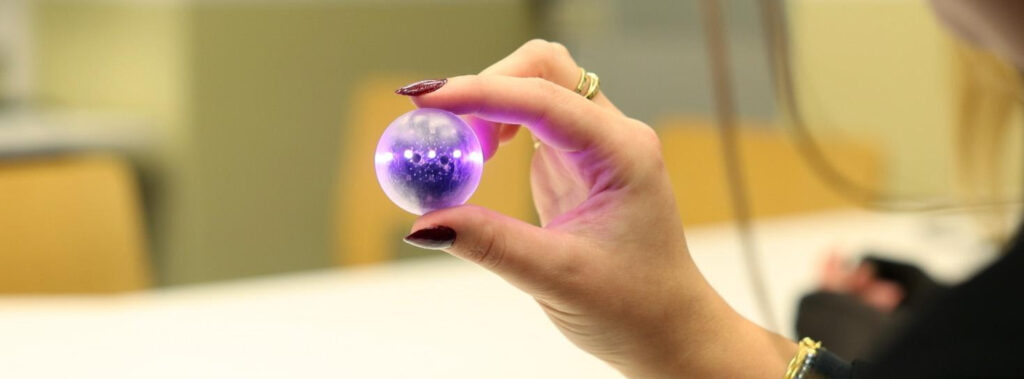 Meet the Qbead: a qubit in the palm of your hands