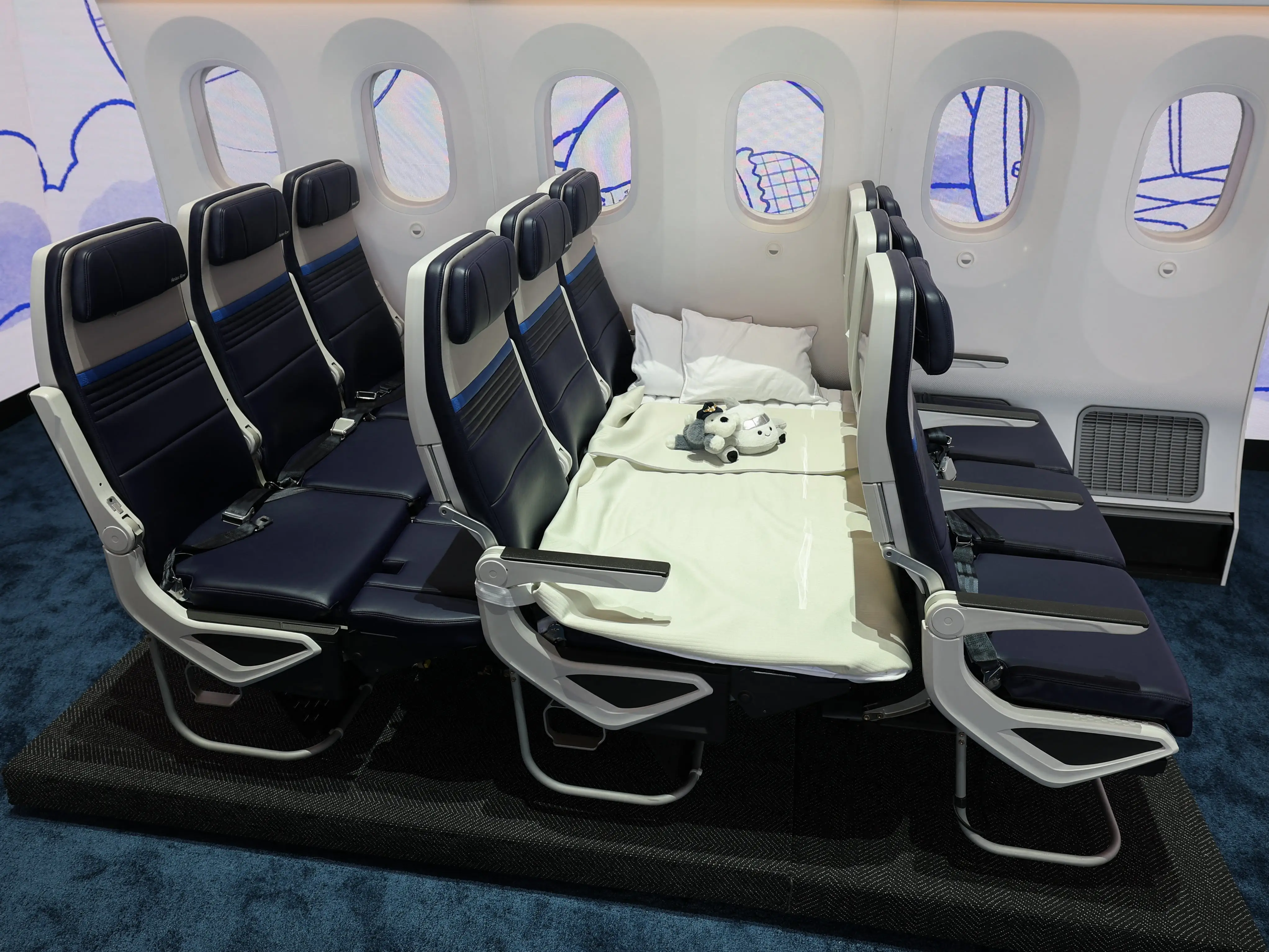 These 6 airlines offer beds in economy, with prices ranging from $150 to $2,600. Here's how to book them.